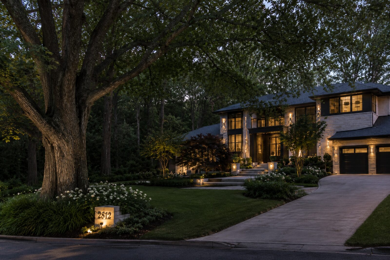 An established residence framed by a grand, mature oak